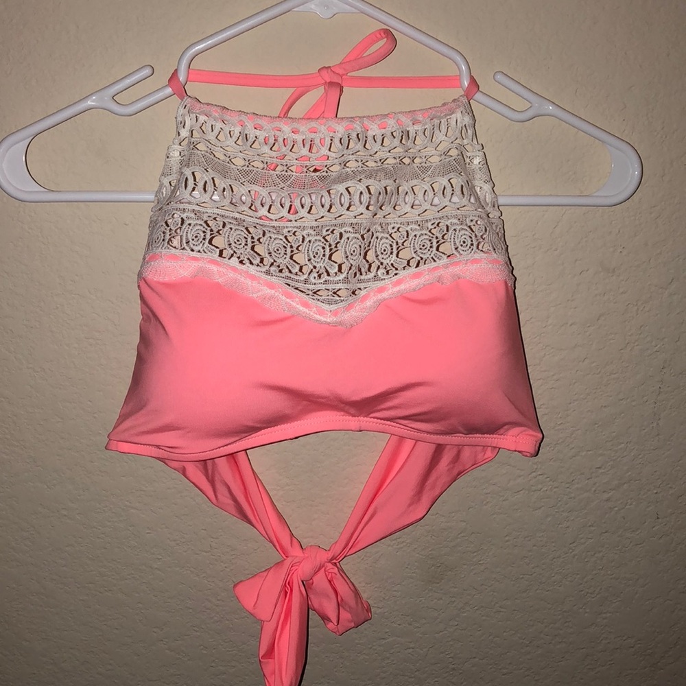 Pink and white bathing suit top